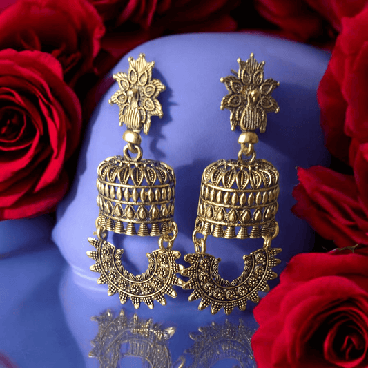 Antique gold-toned temple earrings with intricate floral and cylindrical design