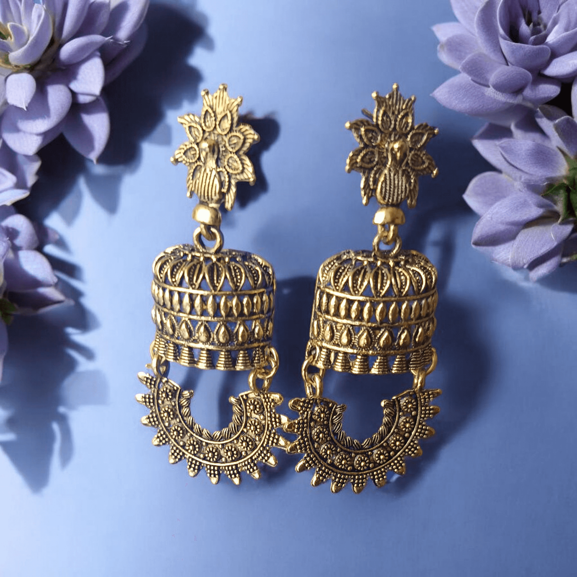 Antique gold-toned temple earrings with intricate floral and cylindrical design