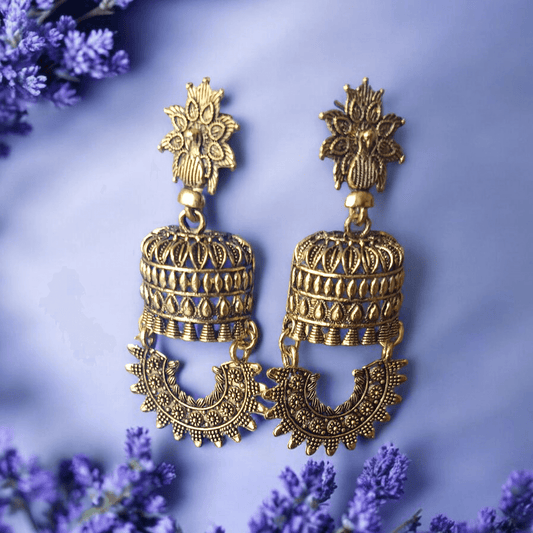 Antique gold-toned temple earrings with intricate floral and cylindrical design